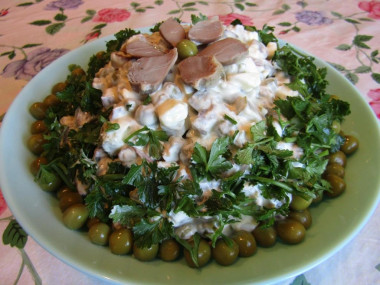 Budget salad with chicken stomachs and fried mushrooms