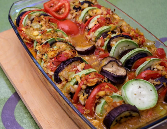 Fish ratatouille with pollock and vegetables baked in the oven