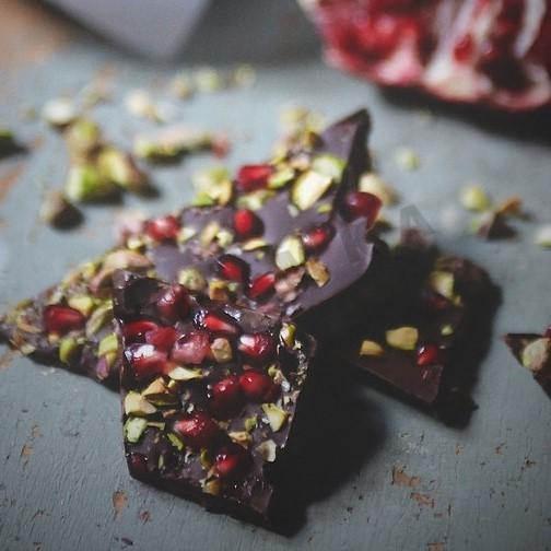 Chocolate with pistachios and pomegranate seeds