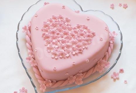 Pink Heart cake with chocolate and nuts
