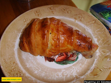 Chicken legs with cheese in a puff pastry bag