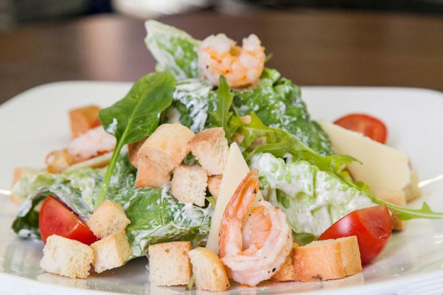 Caesar salad with shrimp and mayonnaise