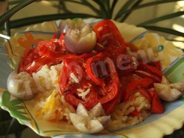 Rice with tomatoes under a fur coat