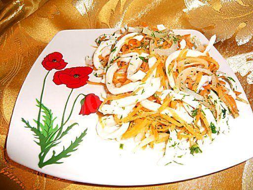 Squid salad with onions and carrots