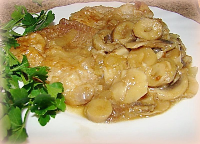 Chops with champignons in beer