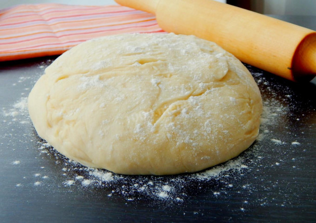 The dough for chebureks is simple on water with flour and salt