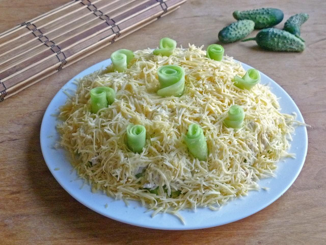 Tenderness salad with cucumbers and chicken and cheese