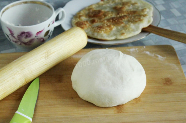 Tortilla dough in a frying pan