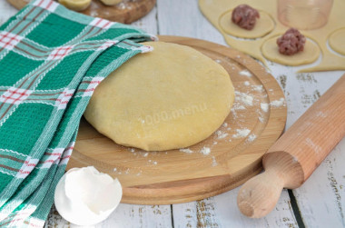 Custard dough on water with egg for cooking