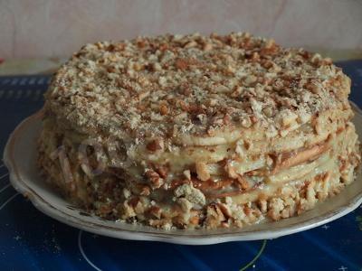 Cake with walnuts and condensed milk in a frying pan