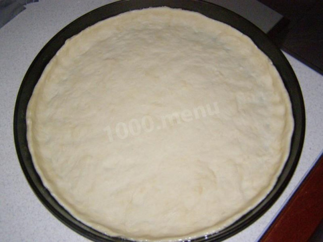 Yeast dough base for pizza in the oven