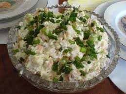 Olivier salad with beef tongue and cucumbers