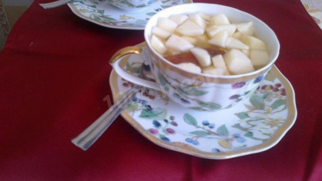 Black tea with apples, sugar and cinnamon