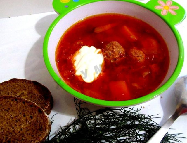 Siberian borscht with meatballs and tomato paste