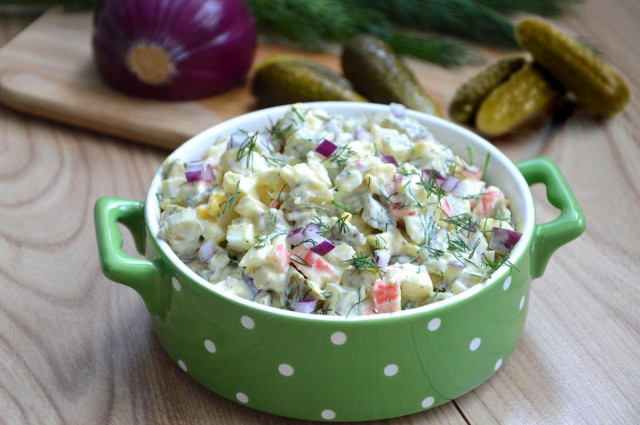 Salad with crab sticks and pickled cucumber