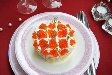Royal salad with caviar and squid