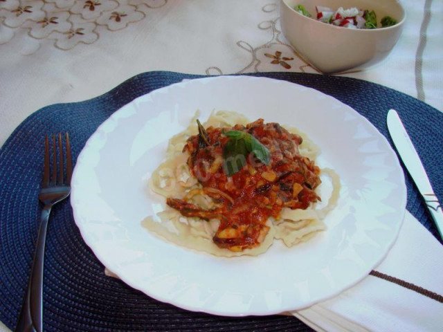 Pasta with seafood in tomato sauce