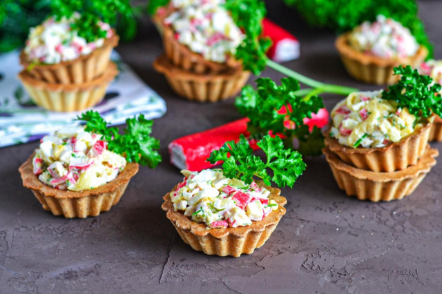 Tartlets with crab sticks cheese and egg