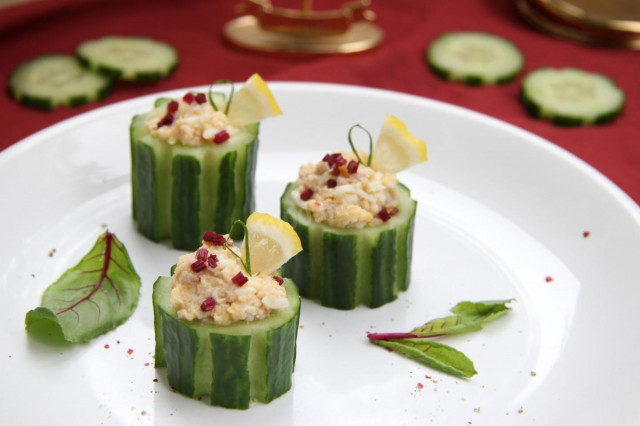 Stuffed cucumbers with egg and cod liver