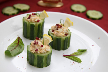 Stuffed cucumbers with egg and cod liver