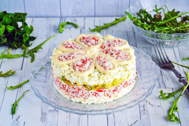 Salad with melted cheese and crab sticks