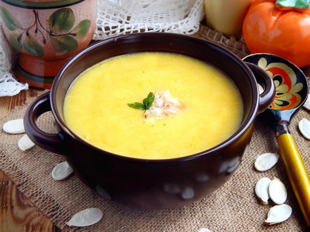 Pumpkin puree soup with melted cheese
