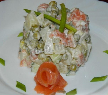 Olivier salad with salmon and cucumber
