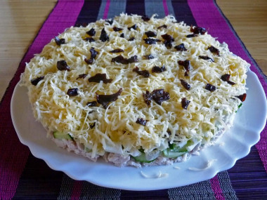 Ladies' caprice salad with chicken and prunes