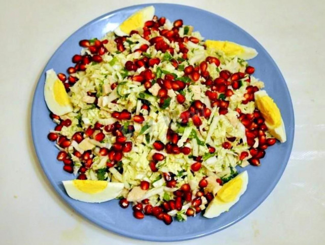 Salad with Peking cabbage and pomegranate