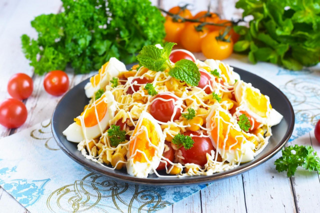 Simple salad with egg and cheese