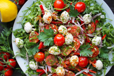 Salad with mozzarella cheese and cherry tomatoes