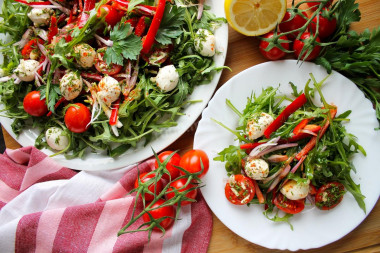 Salad with mozzarella cheese and cherry tomatoes