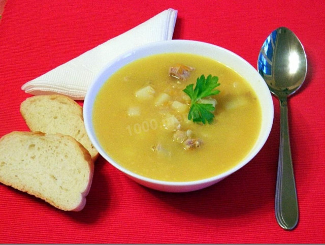 Soup with boiled peas with pieces of meat