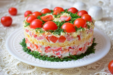 Red Sea salad with crab sticks tomatoes and peppers