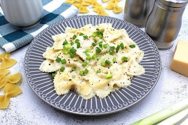 Pasta in sauce with milk and butter with cheese