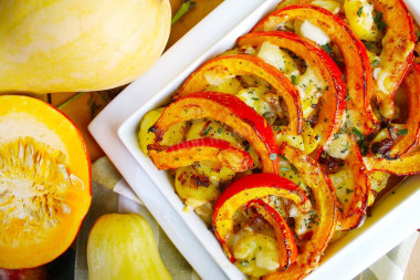 Pumpkin with honey and potatoes baked in the oven