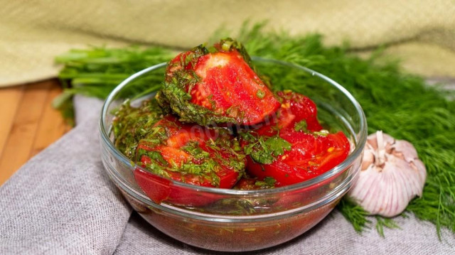 Tomatoes with herbs and garlic in tomato filling