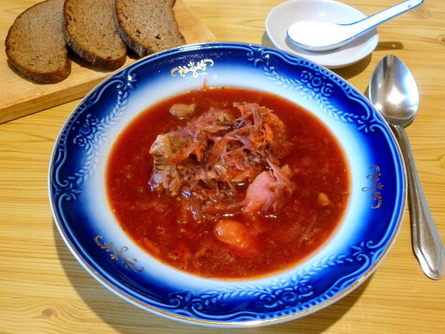 Classic beef borscht with beetroot and tomato paste