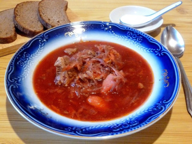 Classic beef borscht with beetroot and tomato paste