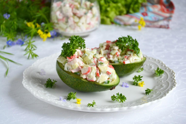 Avocado with crab sticks salad