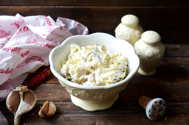 Salad with chicken and pickled cucumbers