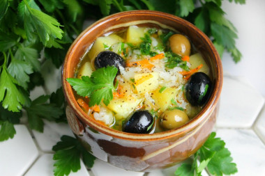 Soup with rice and olives