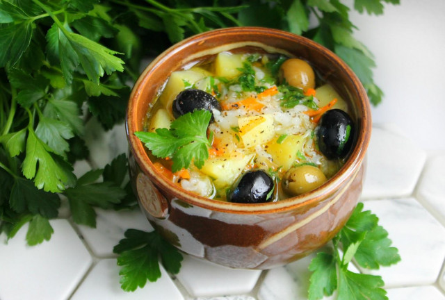 Soup with rice and olives