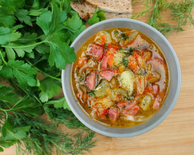 Young cabbage soup with smoked sausage