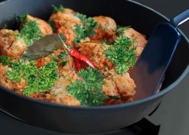 Lazy cabbage rolls with tomato paste fried in a pan