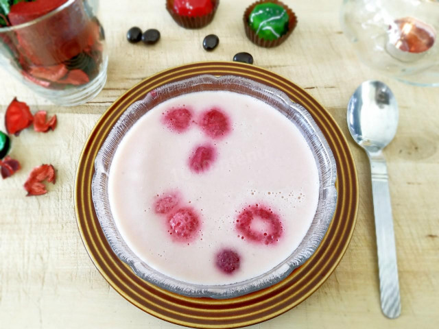 Milk jelly with banana and raspberries