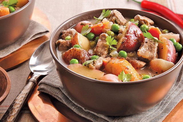 Stew with vegetables in a cauldron