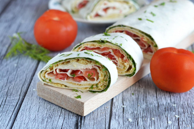 Pita bread roll with tomatoes and cheese