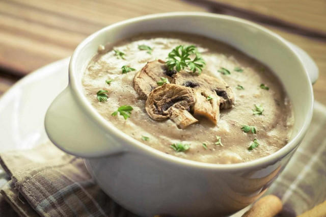 Cheese soup with mushrooms in a slow cooker