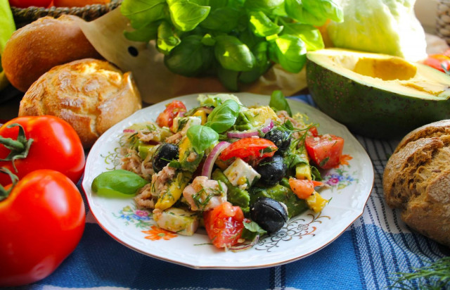 Mediterranean salad with tuna, cheese, avocado and olives